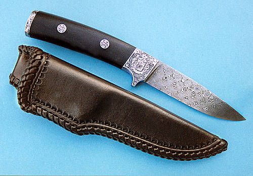 Nr.15 Jagdmesser aus Rosendamast feine Gravur. Griff Ebenholz