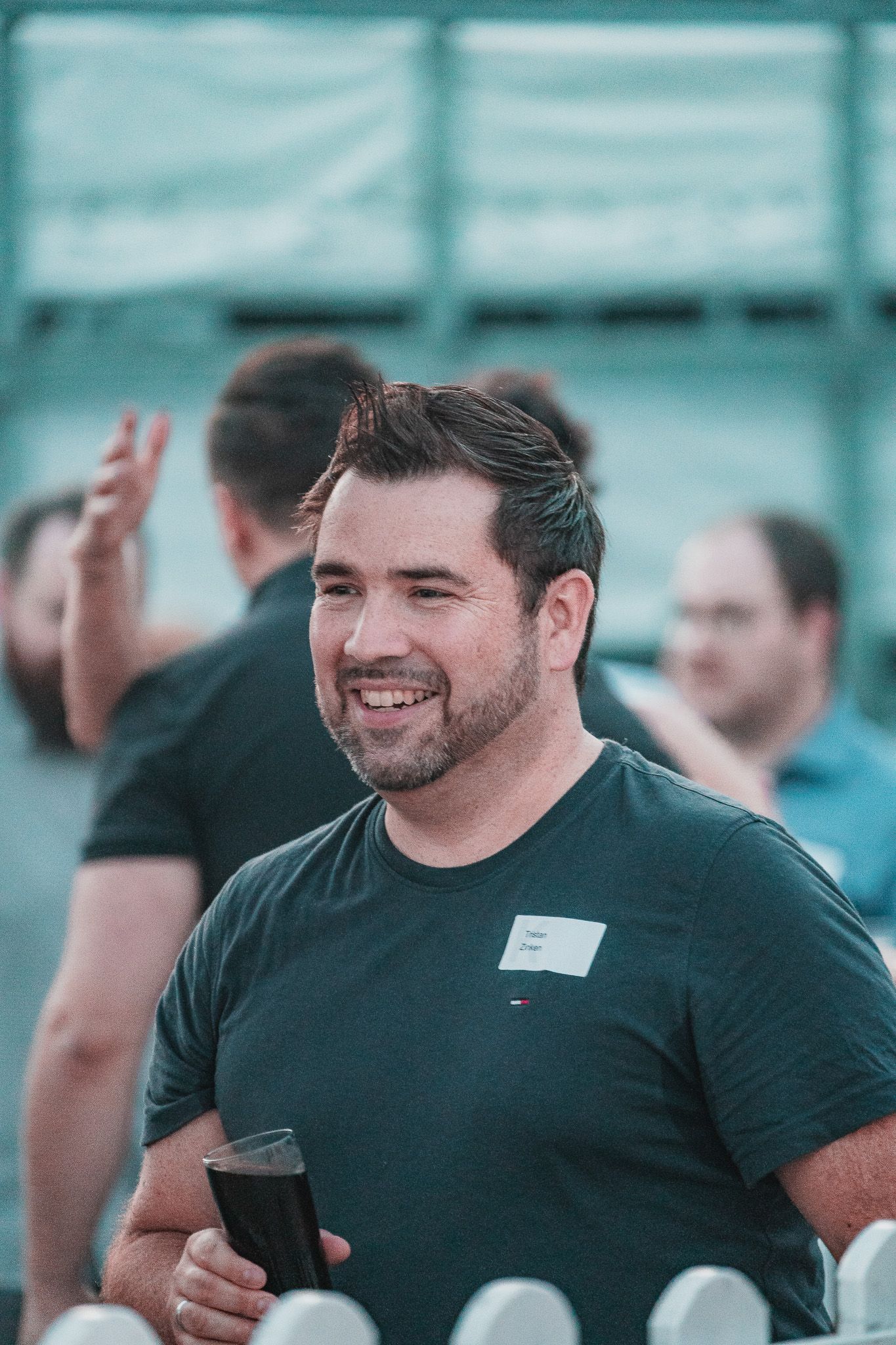 Portraitfoto außen bei einer Firmenfeier von Event Fotograf Hannes Schmidt in Aachen