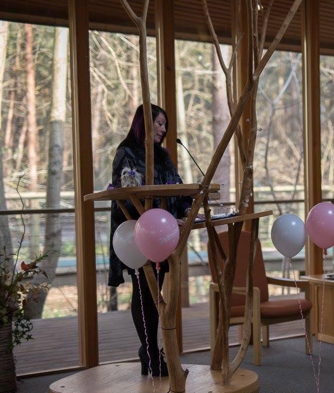 civil celebrant conducting a funeral in the woods