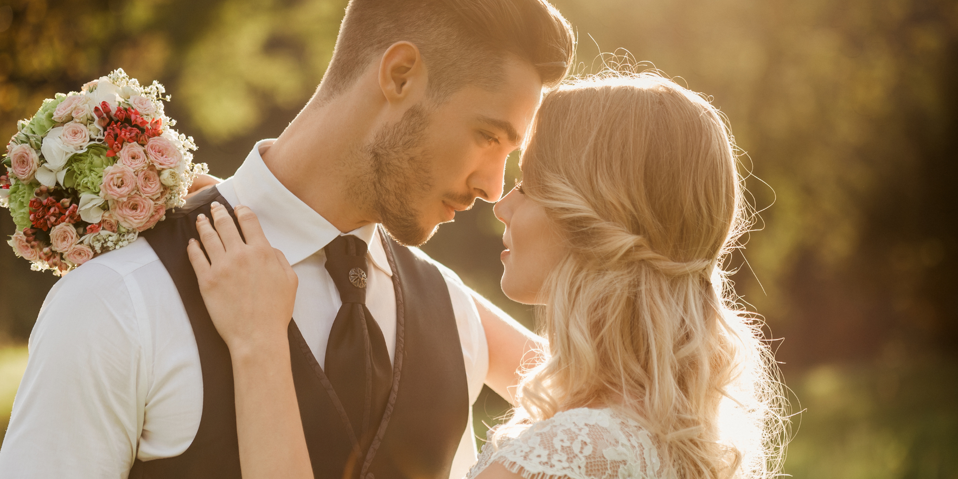 man & woman looking lovingly at each other at a wedding