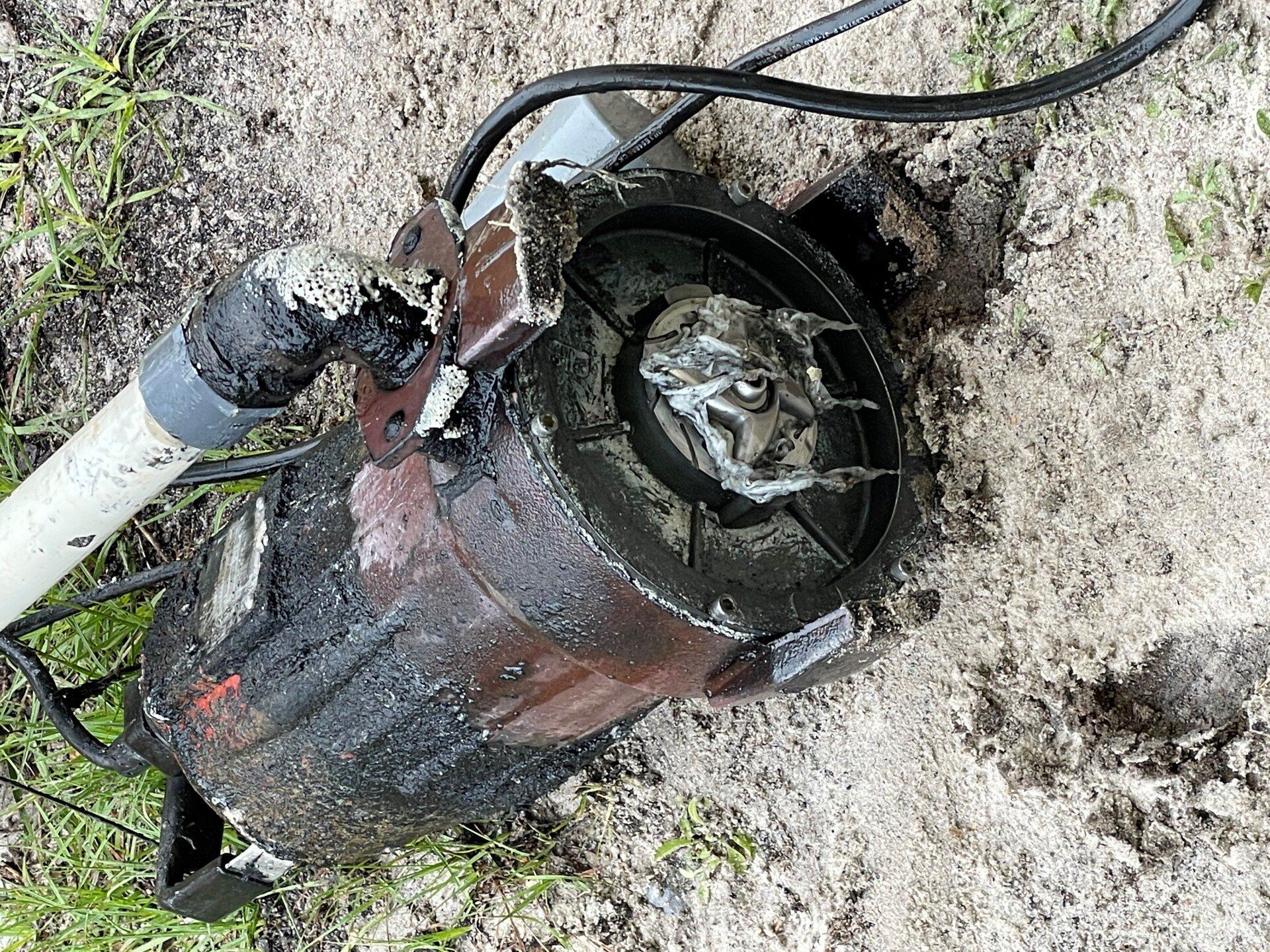 Bruce's Plumbing - A pump jammed with a wet wipe.