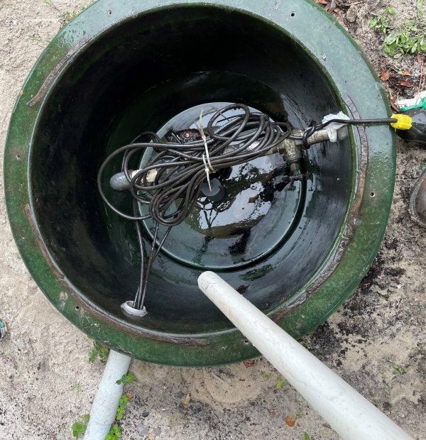 Bruce's Plumbing - A properly cleaned grinder basin.