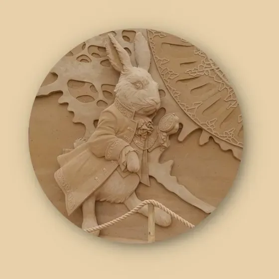 Sandskulptur vom Hasen aus Alice im Wunderland Sandskulptur vom Hasen aus Alice im Wunderland,