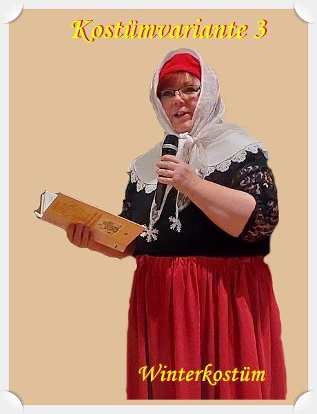 roter langer Rock, schwarze Bluse, weißes Kopftuch, rote Kappe,