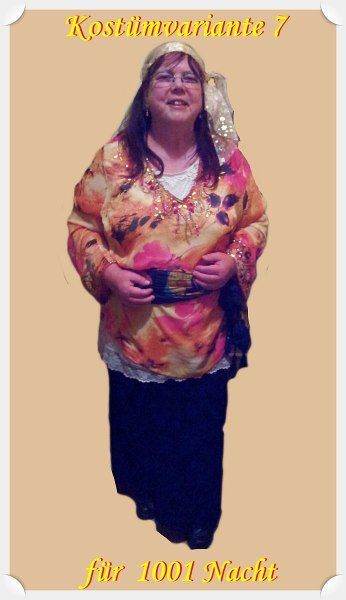 Bluse aus Seidentüll mit Strasssteinen bestickt, langer schwarzer Rock, Stirnband,