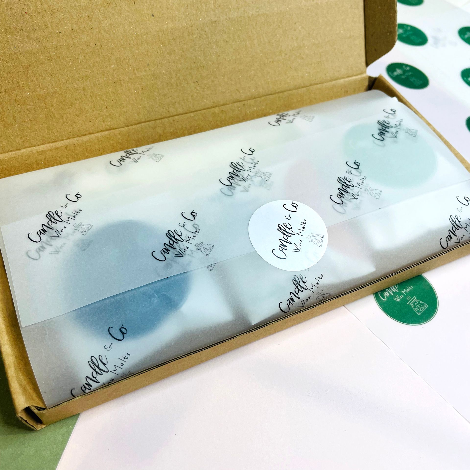Business packaging, personalised with logo, small runs stickers and velum paper and biodegradable glassine bags
