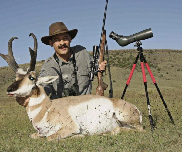 Hunter behind velvet antlers 6