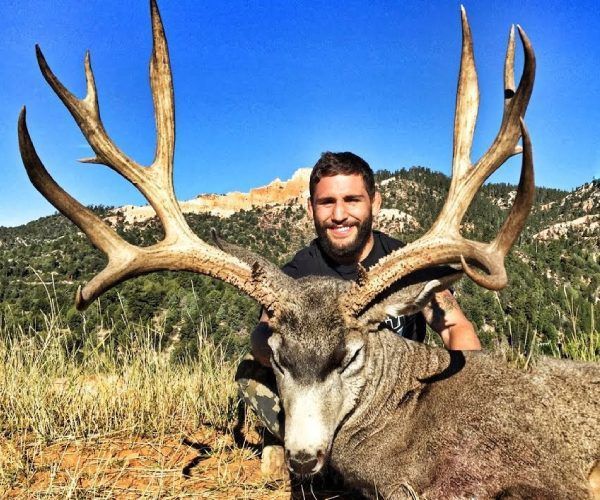 Hunter behind velvet antlers 7