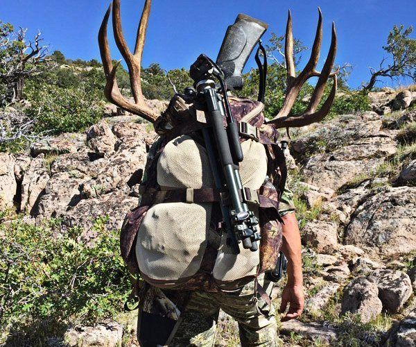 Hunter behind velvet antlers 8