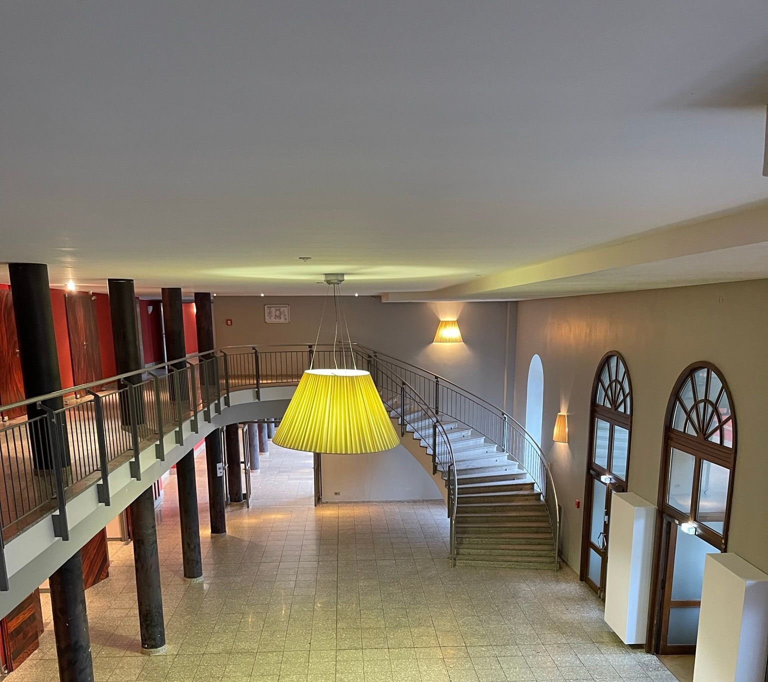 Main foyer with staircase to the gallery (right) BALZER Event Location Zoo Clubhouse Main Foyer with Gallery Staircase on the Right