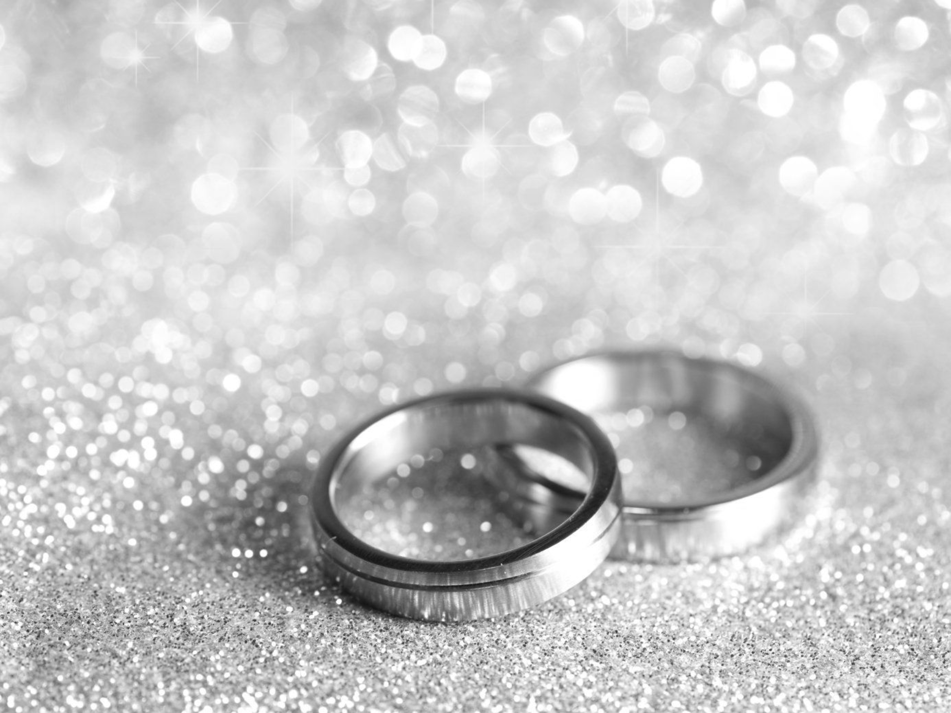 WEDDING DJ link - wedding rings on sparkly background