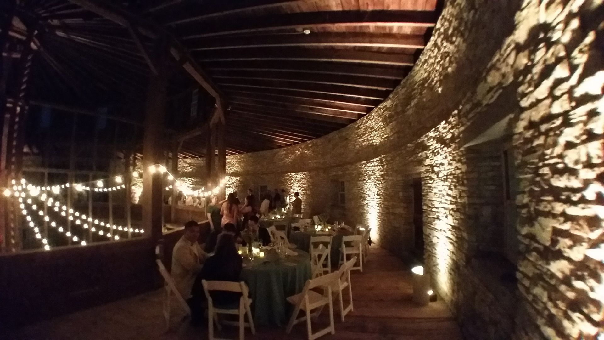 uplighting at this wedding in the historic Round Stone Barn at Hancock Shaker Village in Hancock, Mass.