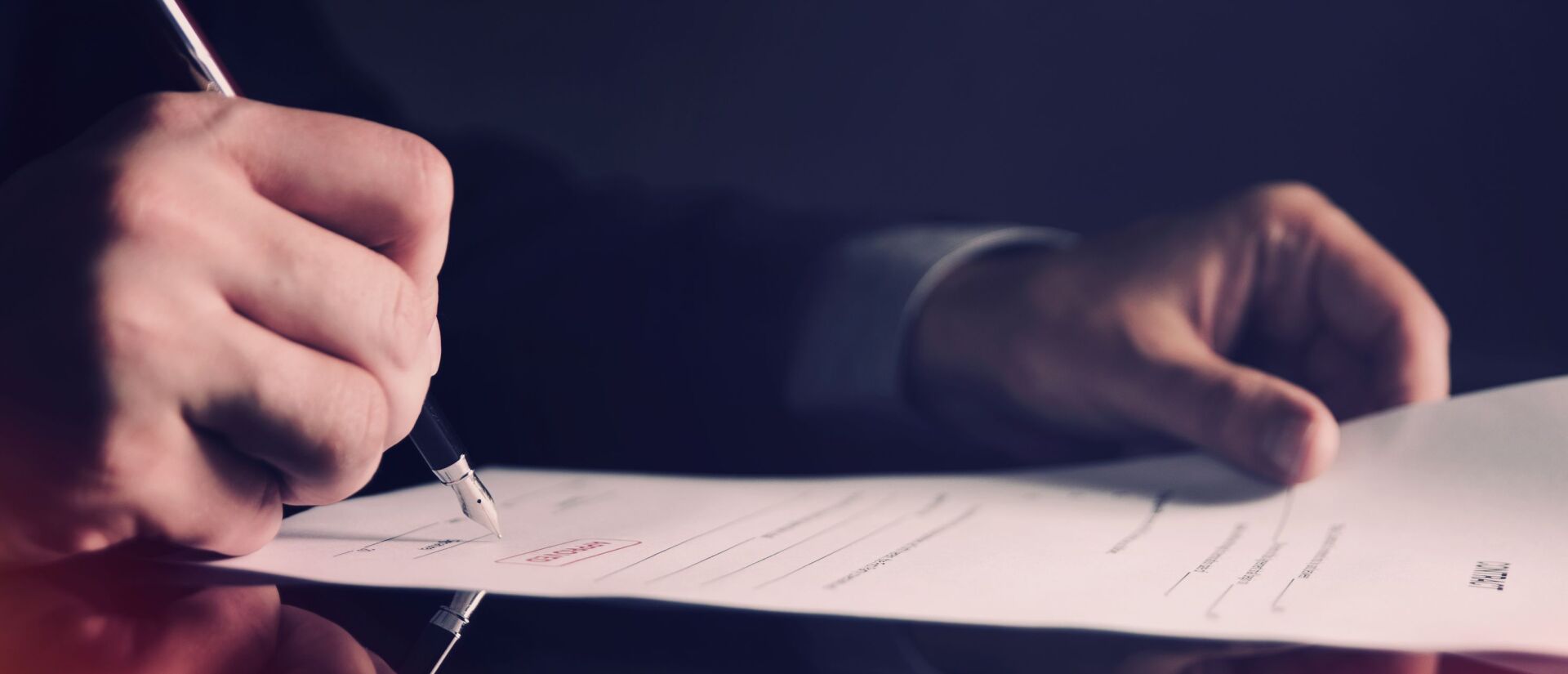 a person filling in a form