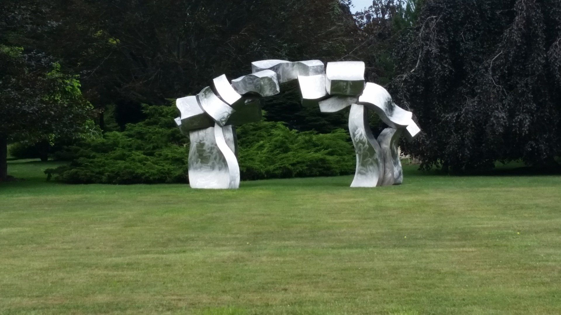 Large outdoor sculpture in a field. Large outdoor sculpture in a field.