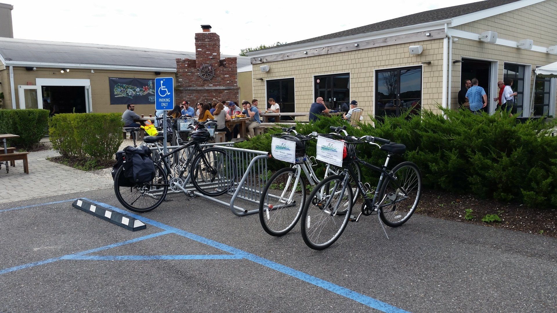 Bicycles parked in front of a brewery. Bicycles parked in front of a brewery.