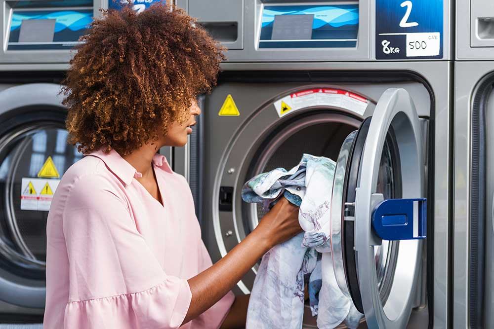 Woman at Laundromat Image