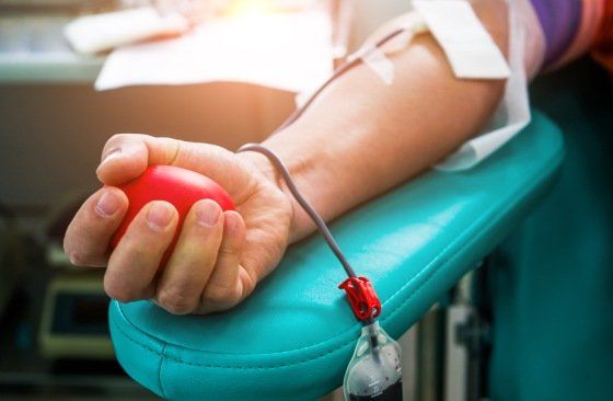 a person having their blood pressure taken