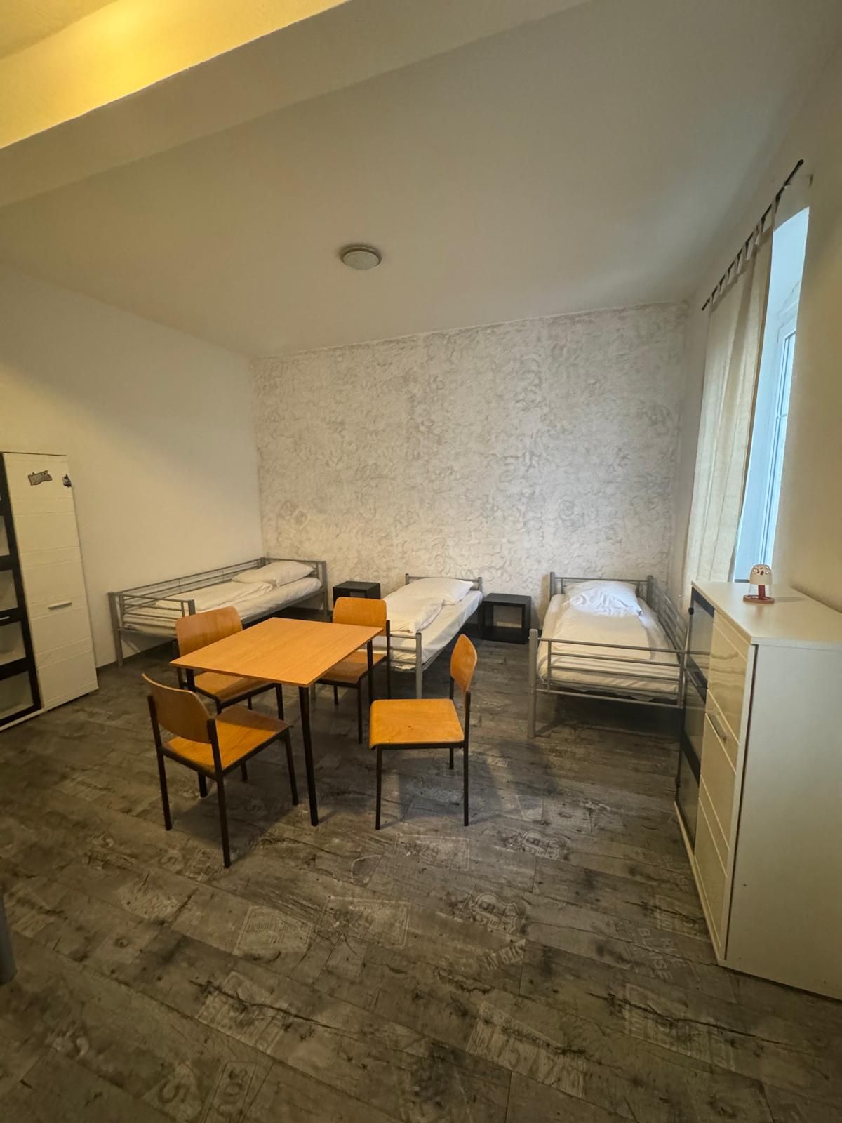 Zimmer mit drei Einzelbetten