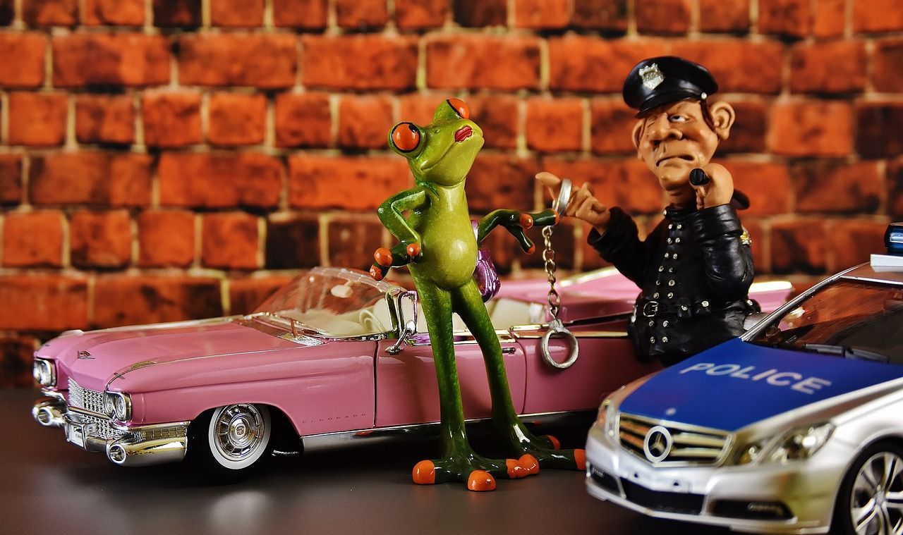 Polizeikontrolle, mit Spielzeugautos nachgestellt