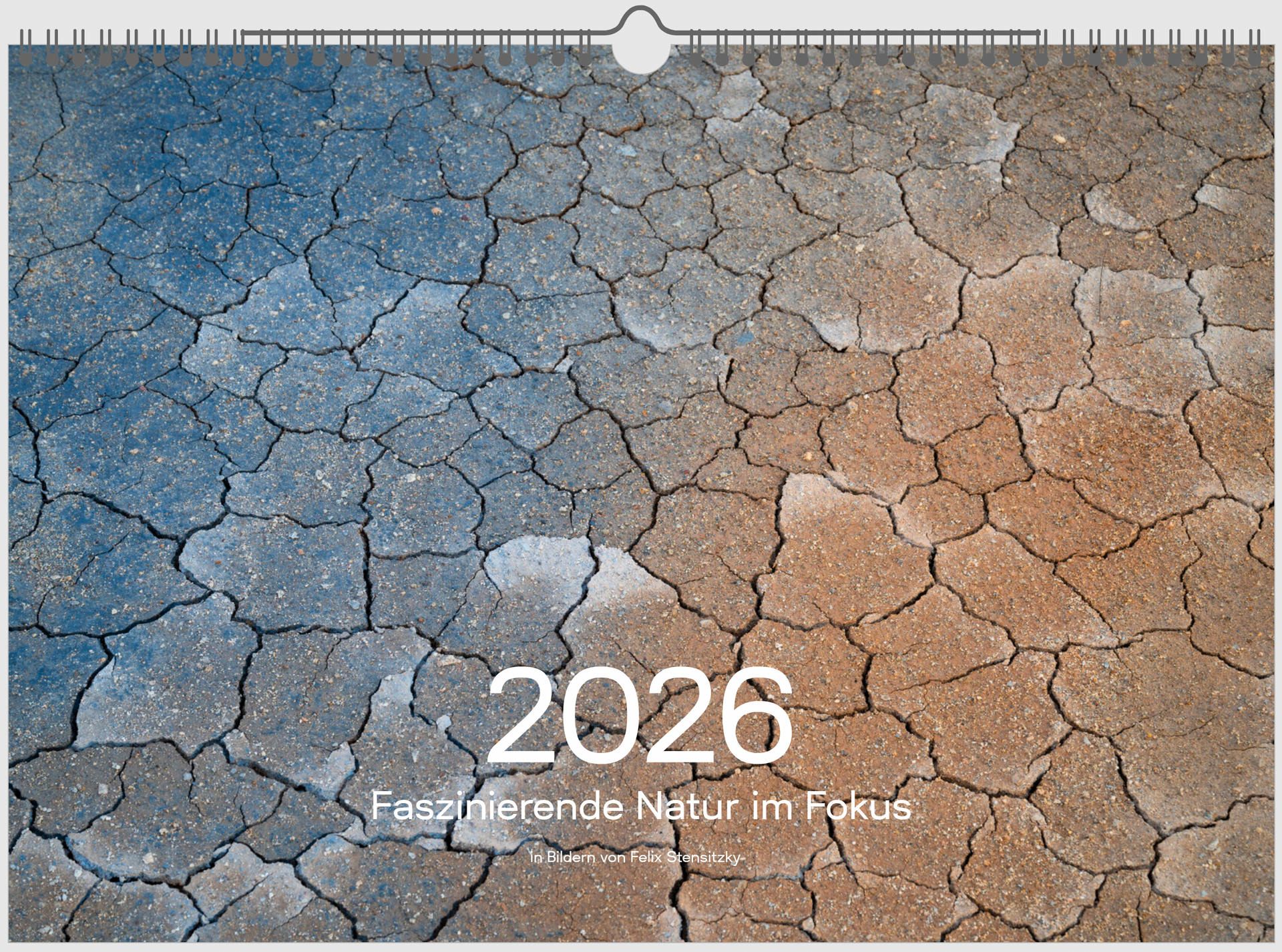 Cover of 2026 calendar with colorful mud cracks