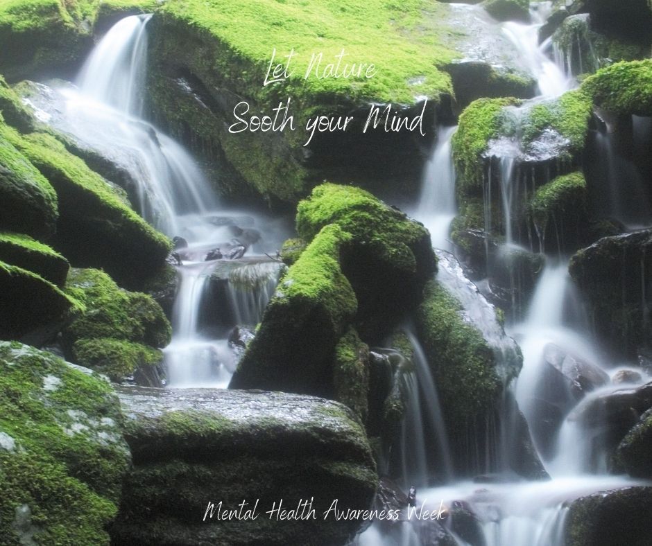 Waterfall tumbling over rocks. Mental Health Awareness. Let nature sooth your mind
