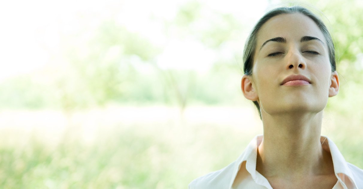 How breathing can help your emotions Woman eyes closed breathing