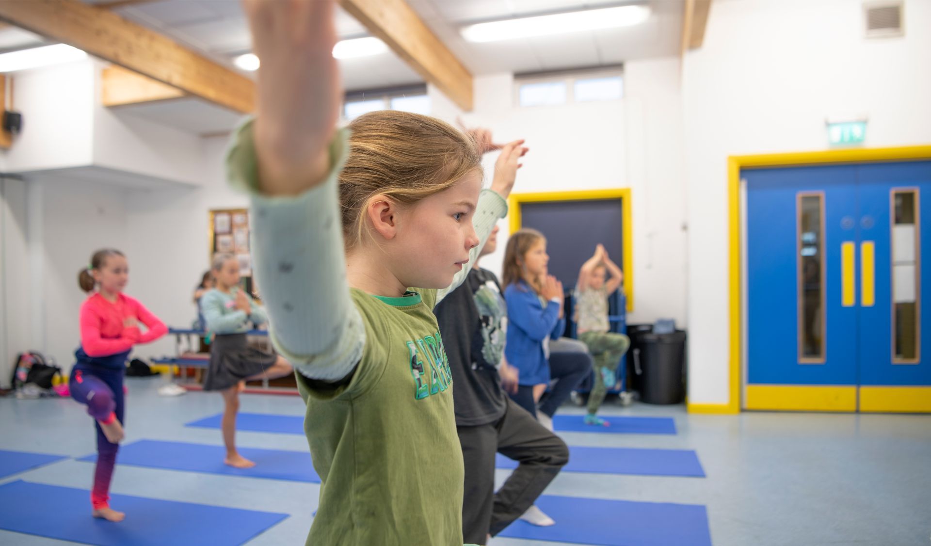 children doing tree pose
