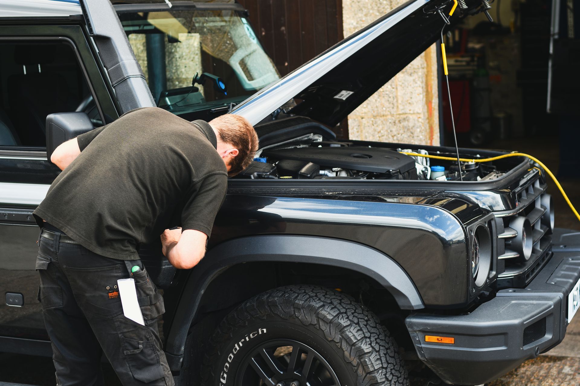 Technician taking off Grenadier snorkel