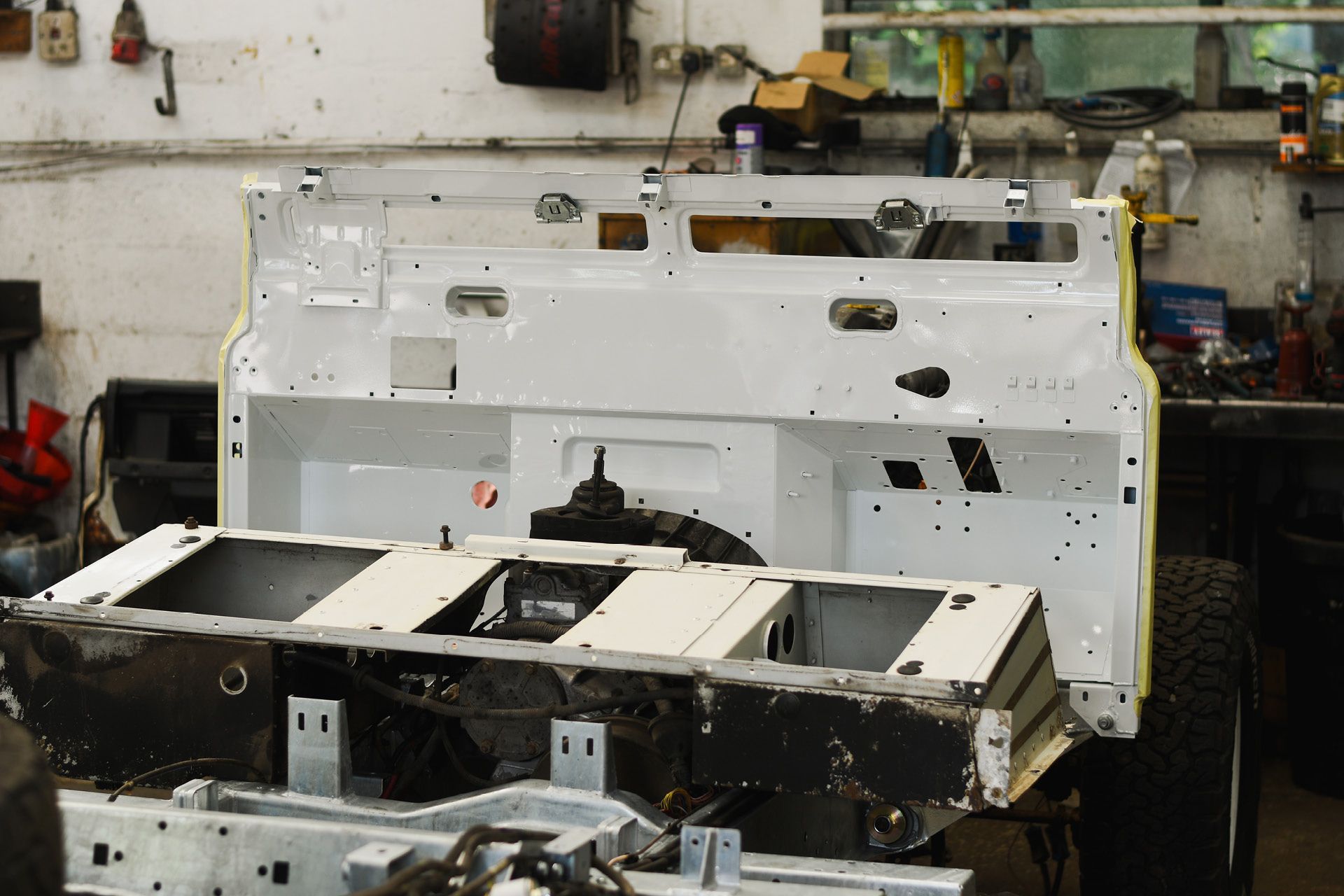 Defender bulkhead and chassis during restoration