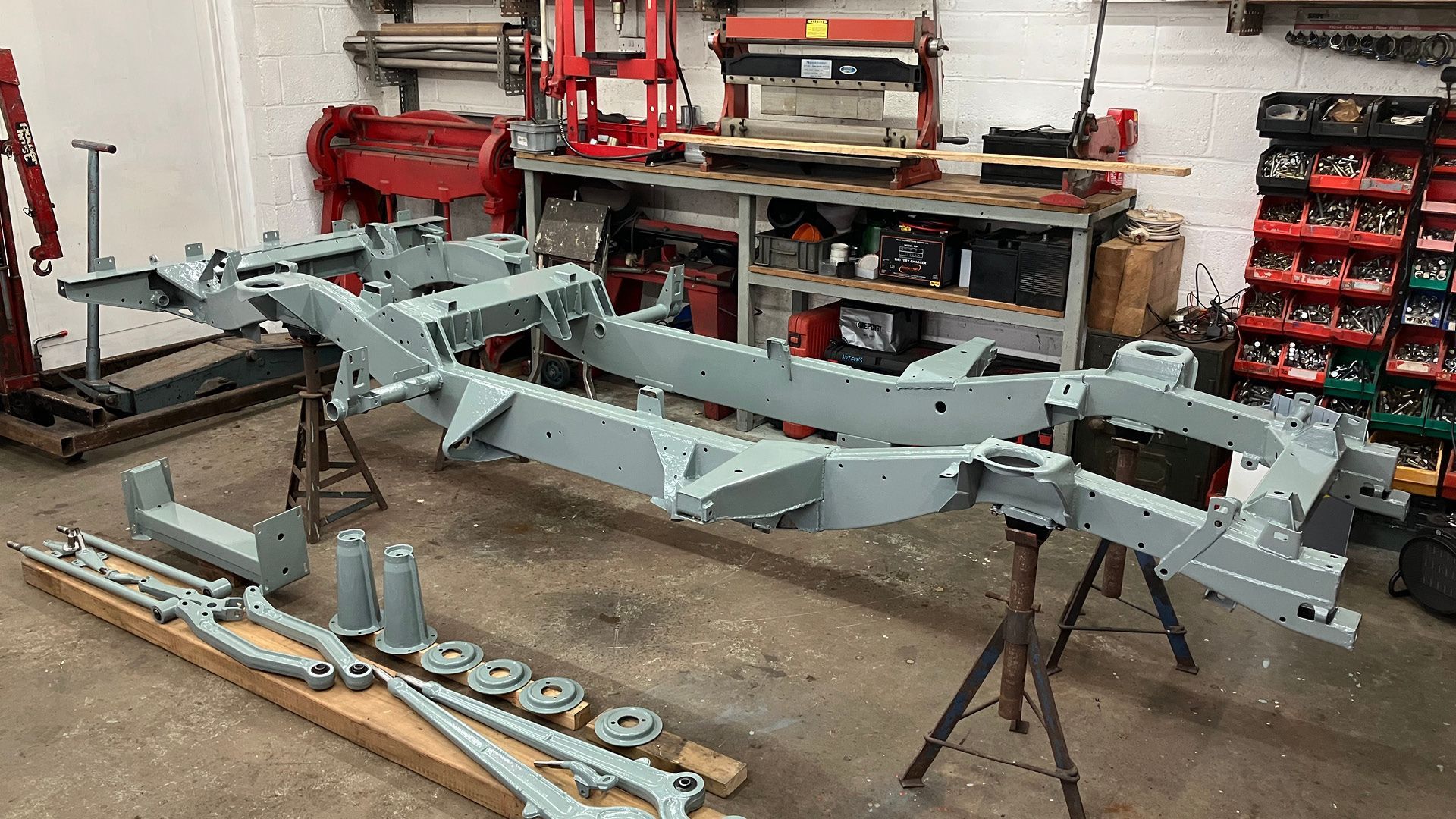 Defender 90 chassis freshly coated in protective grey finish