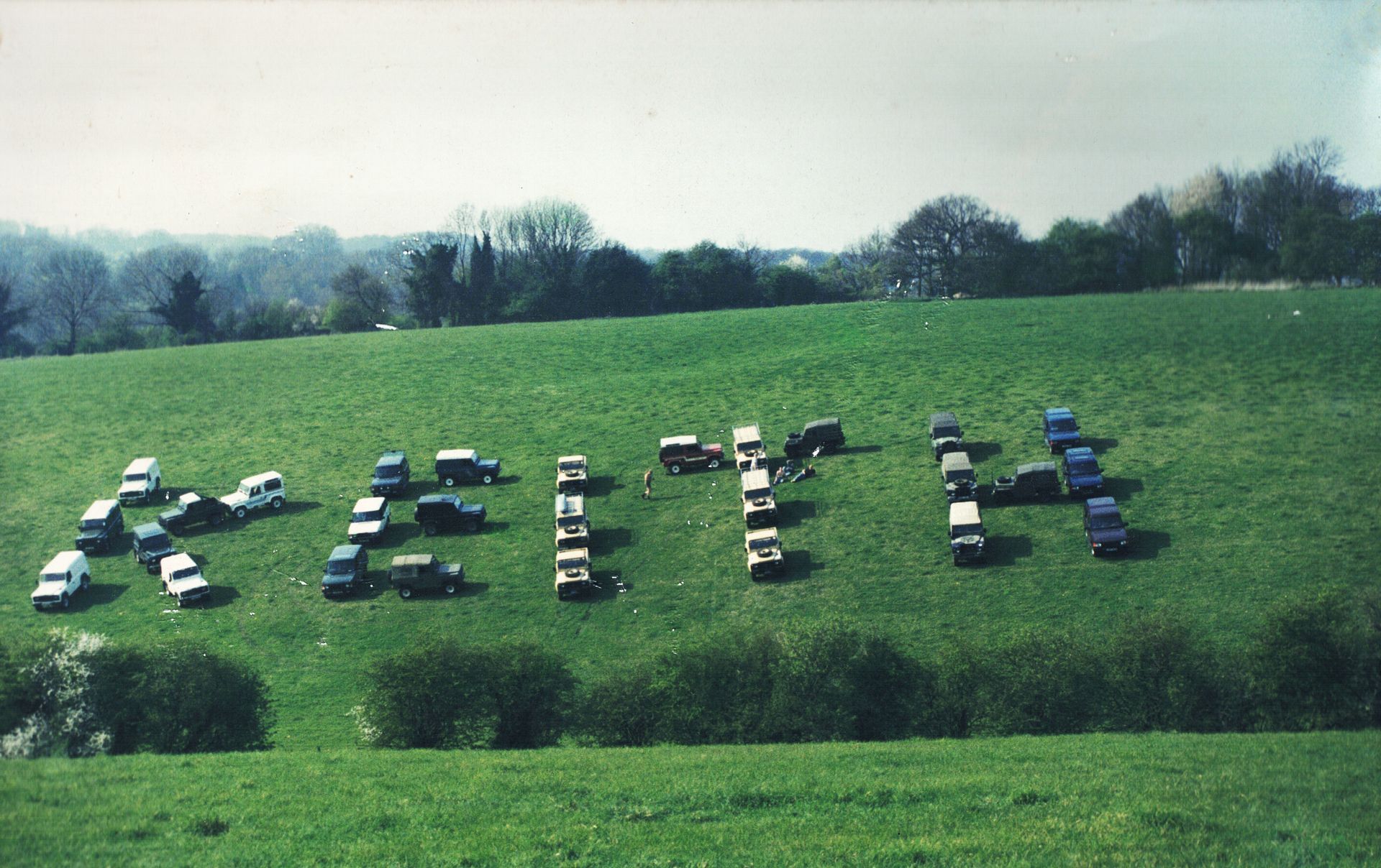 KEITH spelt out in Land Rovers at Keith Gotts