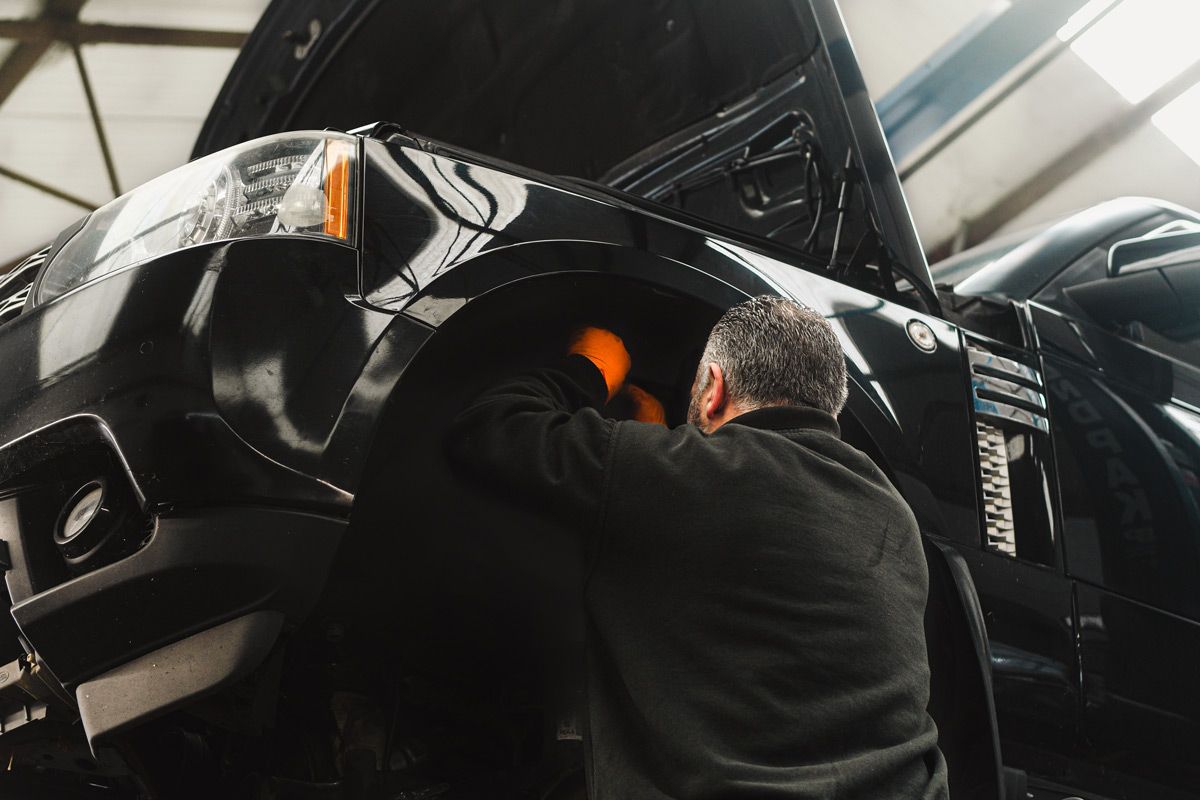 Technician working on a Range Rover
