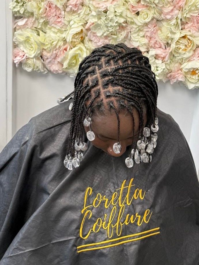 Loretta coiffure, salon de coiffure afro, coiffeur et coiffeuse pierrefitte sur seine à saint-denis, tresses enfants