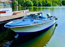 15 PS Sportboot fuehrerscheinfrei auf See bei Sonnenuntergang