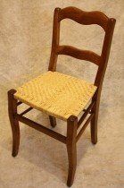 Stuhl mit Köpergeflecht