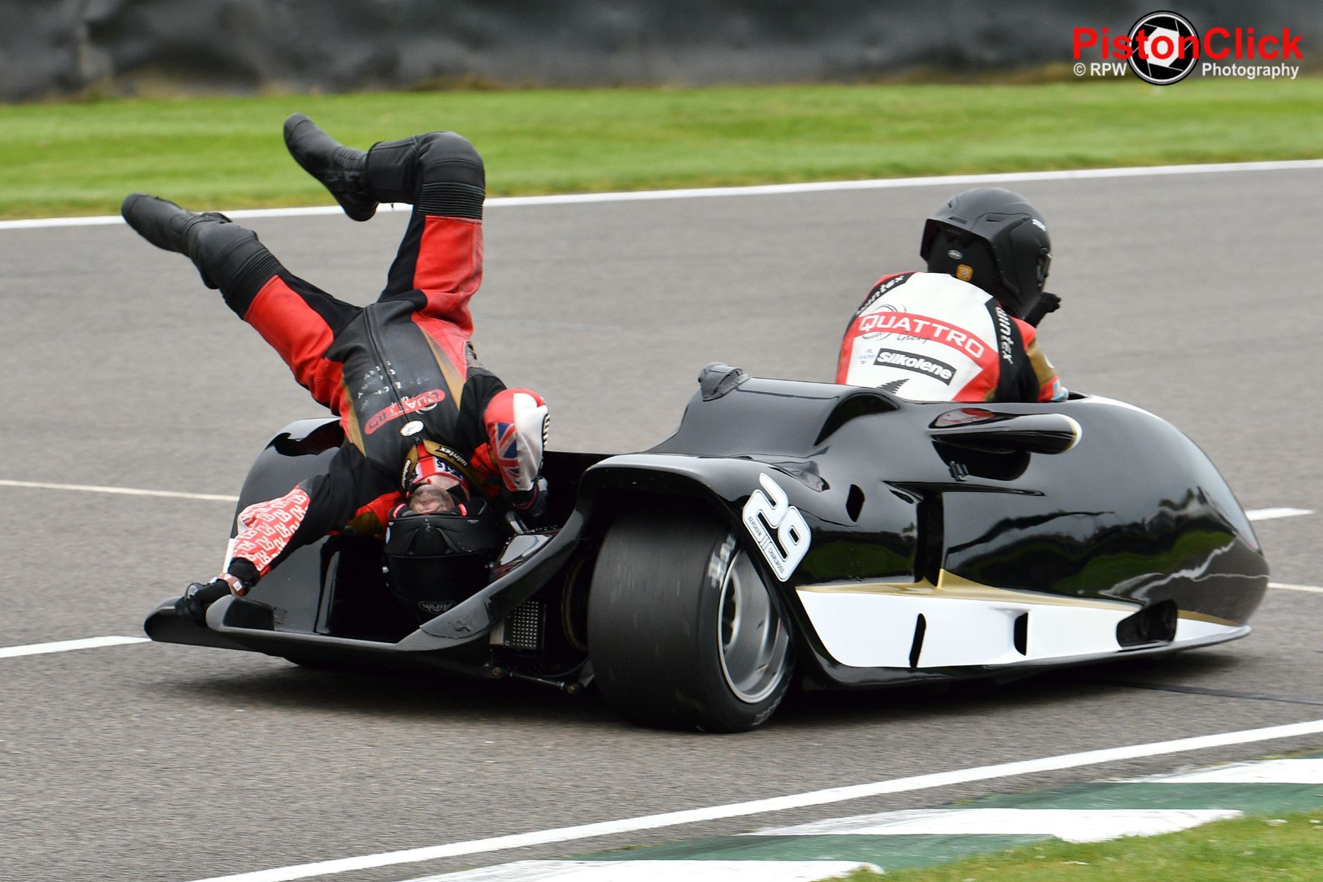 Steve Kershaw and Ryan Charlwood handstand at Goodwood.