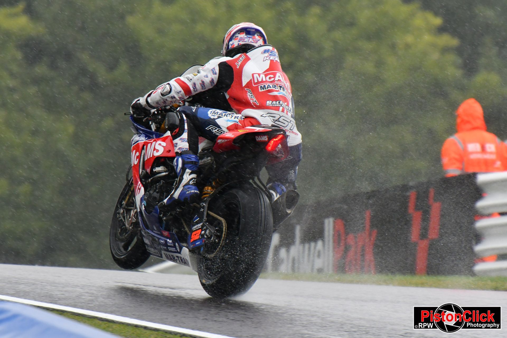 BSB motorcycle racing in the rain at Cadwell Park
