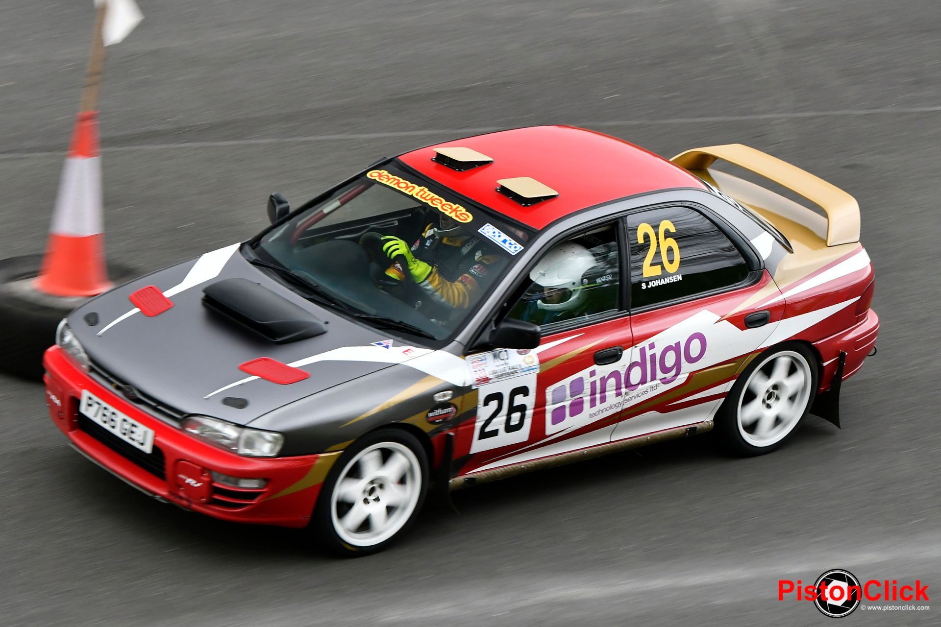 Stephen Johansen and Charlie Stephens in a Subaru Impreza rally car