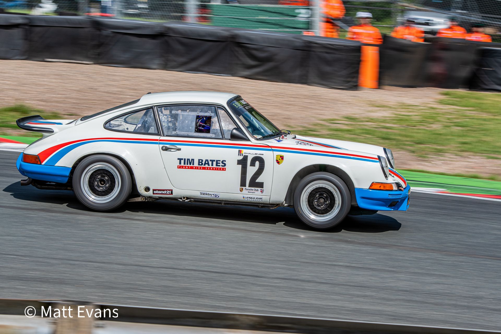 Porsche 911 racing in the 911 challenge at Oulton Park