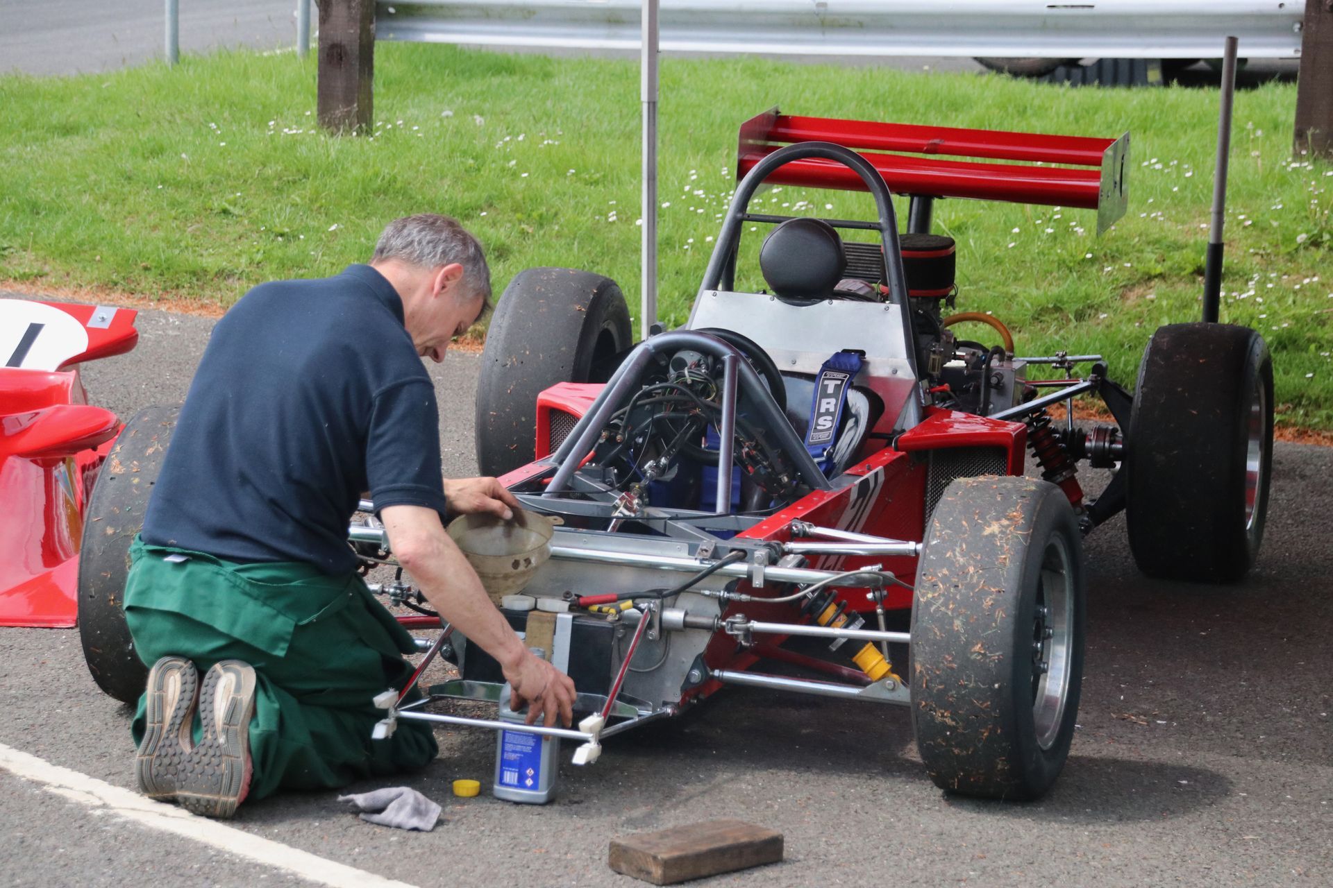 HSCC maintaining historic races cars in the paddock at Cadwell Park