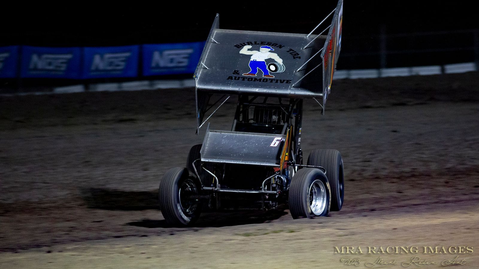 A 410 Sprint Car sliding through Turn 3