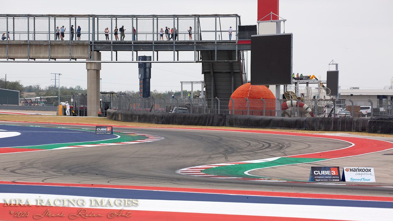 COTA view of the crowd on the Esses Bridge overlooking the track at turn 3.