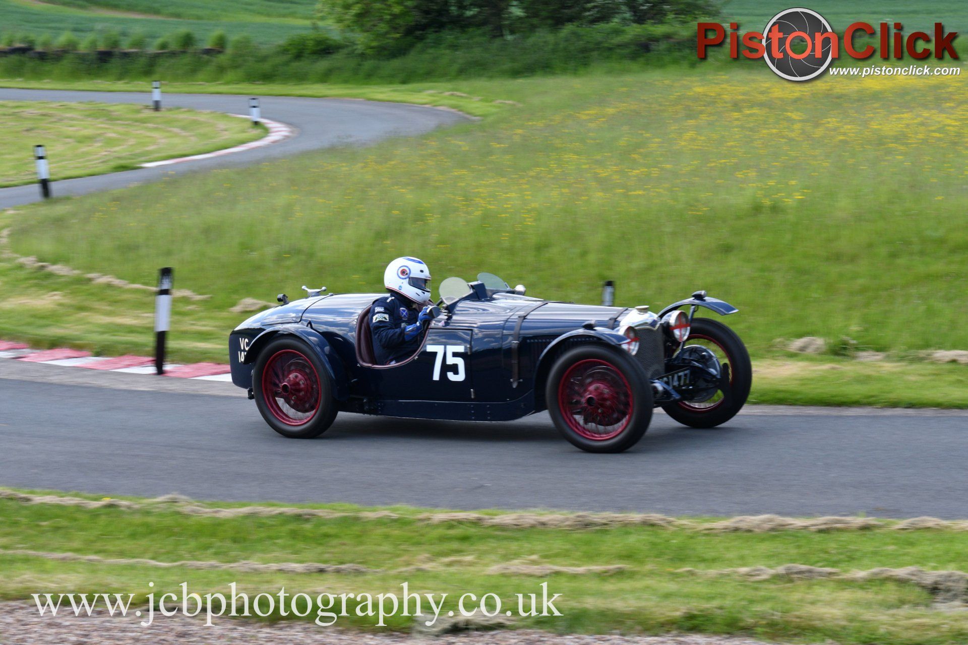 Ian Standing driving aRiley Brooklands