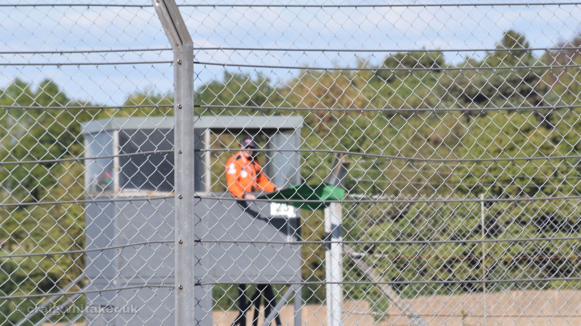 A guide to taking motorsports photography through Safety Fencing.