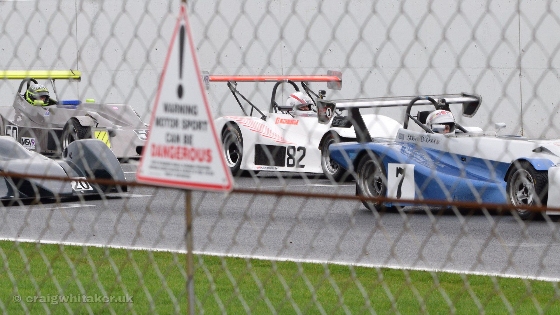 A guide to taking motorsports photography through Safety Fencing.