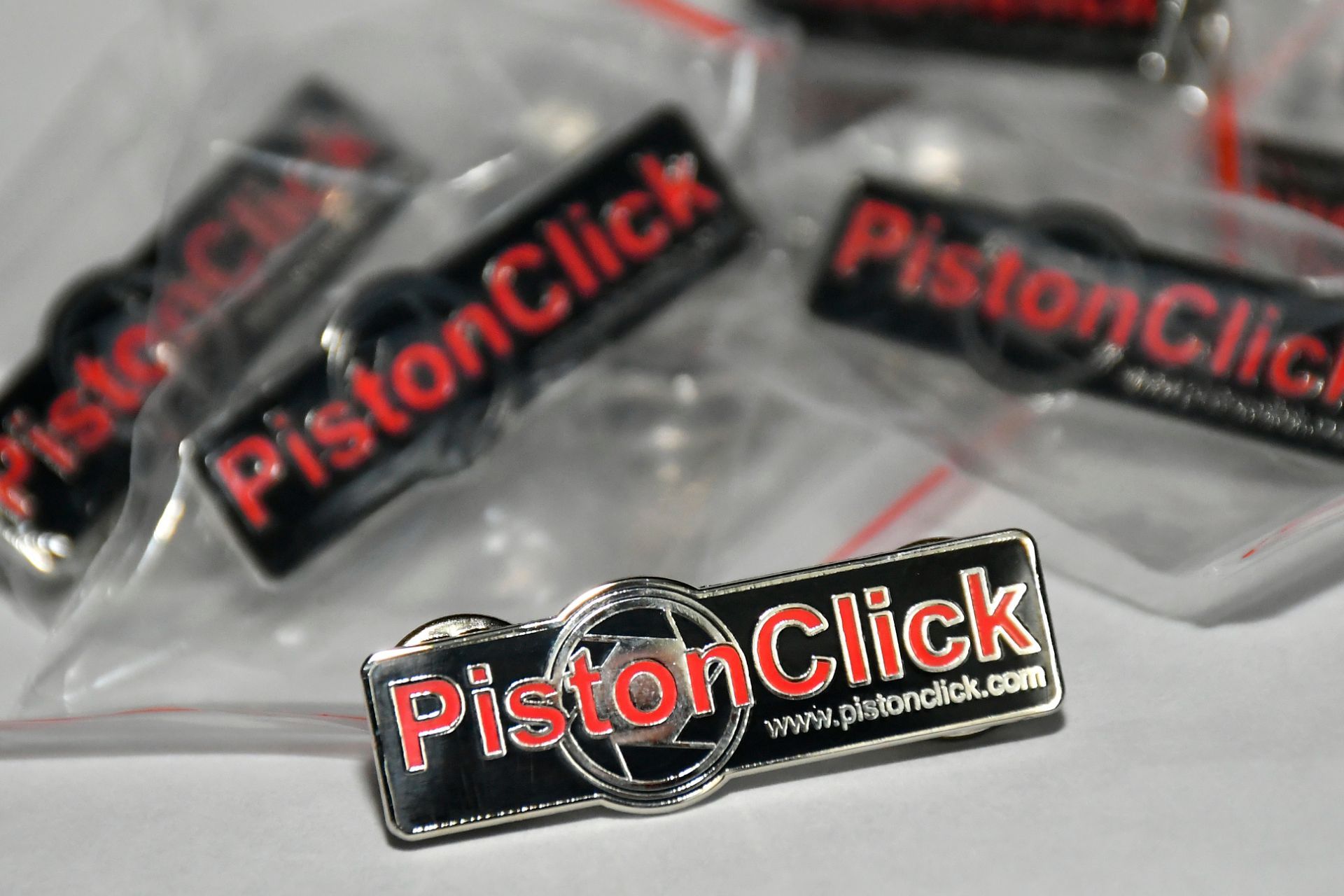 pistonclick badge