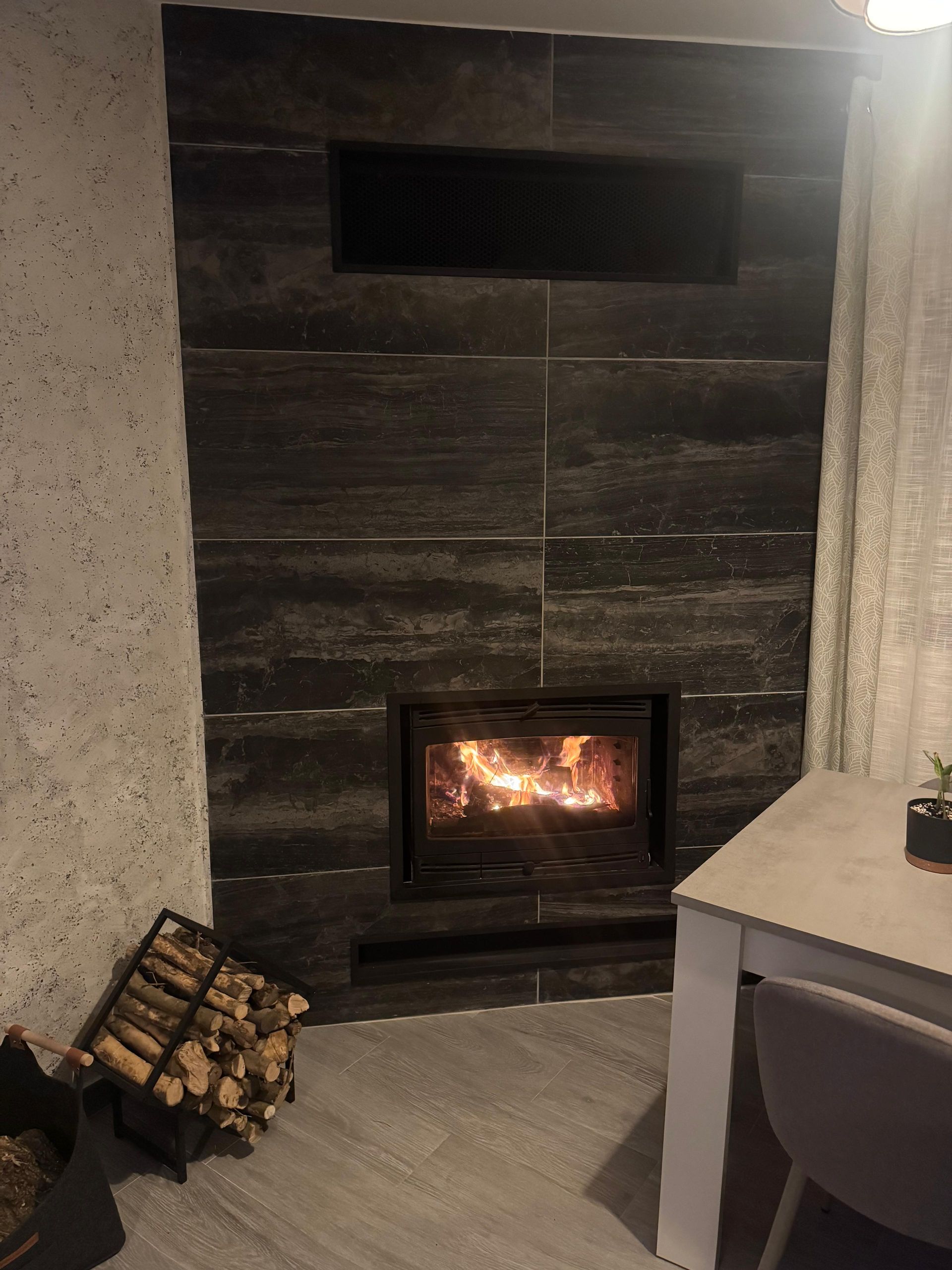 Trabajo de instalación de estufa de pellets por Ecobiometal