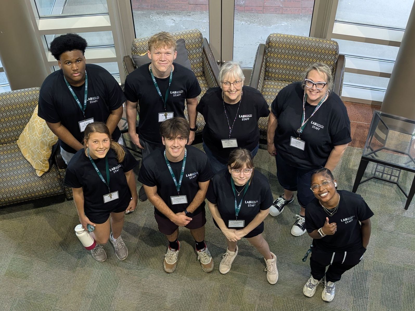 group of LAB students posing on the steps of an academic building