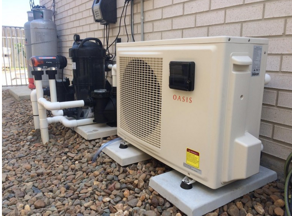 pool heater next to a wall