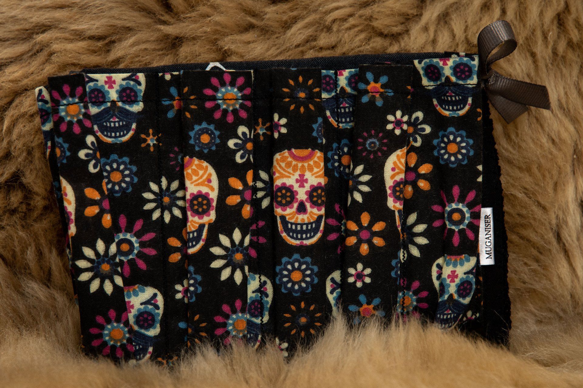 Muganiser display at a craft fair - cloth organiser around a mug